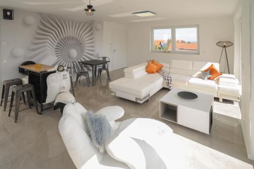 Area soggiorno di Designapartments Die besondere ART - Sennhütte 7
