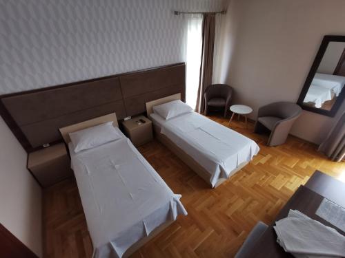 an overhead view of a bedroom with two beds at Villa Salvia in Mostar