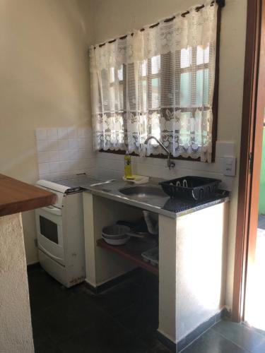 Η κουζίνα ή μικρή κουζίνα στο Pousada Vila Cambury