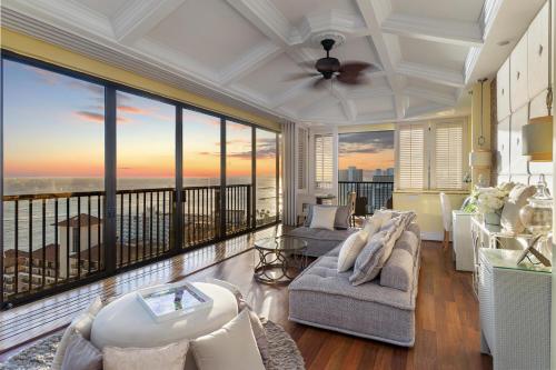 a living room with a view of the ocean at Oceanview Penthouse Suite in Honolulu