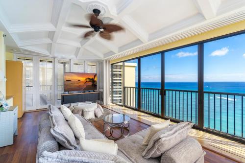 a living room with a view of the ocean at Oceanview Penthouse Suite in Honolulu