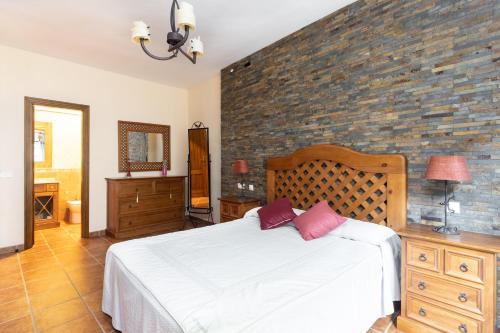 Postel nebo postele na pokoji v ubytování Home2Book Charming Apartment Los Realejos