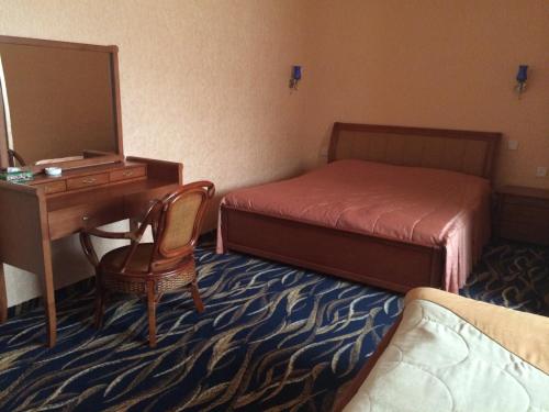 Postel nebo postele na pokoji v ubytování Nairi Hotel