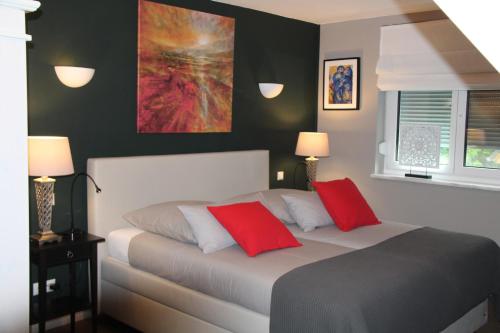 Postel nebo postele na pokoji v ubytování B&B Arlesbrunnen