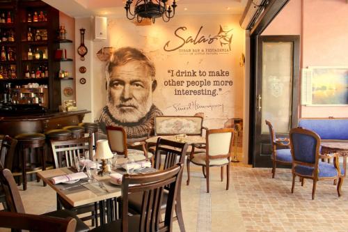 a restaurant with a picture of a man on the wall at Private and Secluded Studio in Little Havana - 6V in Miami