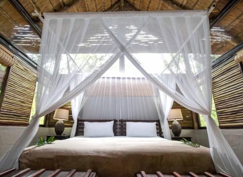 Katil atau katil-katil dalam bilik di Royal Thonga Safari Lodge