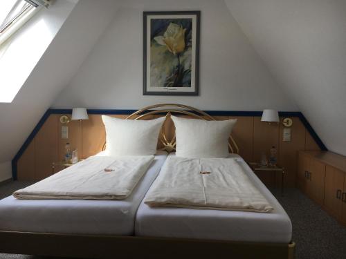 מיטה או מיטות בחדר ב-Hotel Bölke