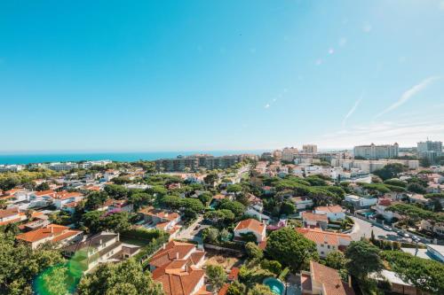an aerial view of a city with houses at Seguros House - Charming Flat in Cascais