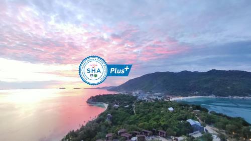 a view of a beach with a sign that reads slsa plus at Little Paradise Haad Rin Koh Phangan in Haad Rin