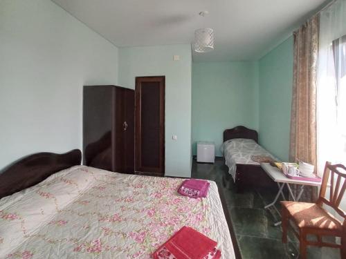 Postel nebo postele na pokoji v ubytování Aparthotel Sofia in Gonio