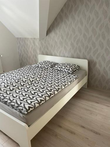 Postel nebo postele na pokoji v ubytování Katica Apartmanok