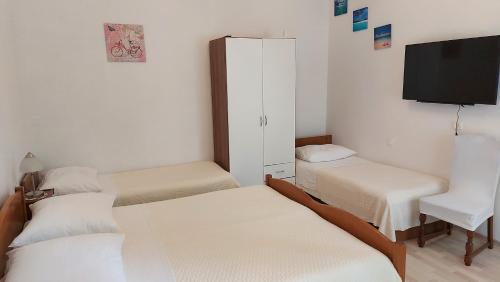 Posteľ alebo postele v izbe v ubytovaní Apartment Jerolima