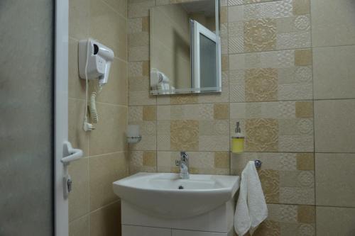 Ένα μπάνιο στο Guest House ERIDA