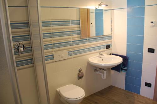Koupelna v ubytování Appartamenti Dany