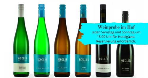 a group of four bottles of wine at Weinhotel Koegler in Eltville