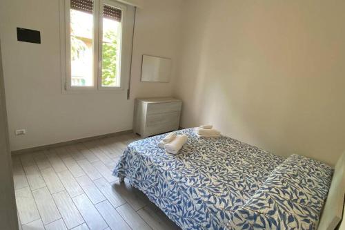 Postel nebo postele na pokoji v ubytování M.G Home a un passo da tutto