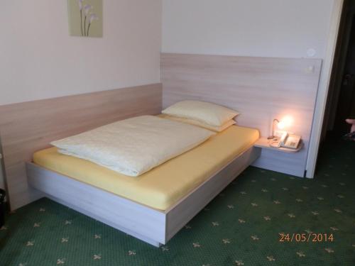 Postel nebo postele na pokoji v ubytování Pension Gstrein