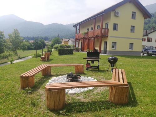 a fire pit in the yard of a house at HišaŠmihelka in Kobarid