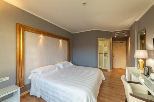 Postel nebo postele na pokoji v ubytování Hotel Repubblica Marinara