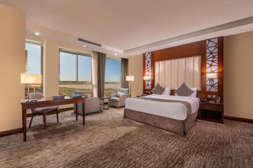 Ένα ή περισσότερα κρεβάτια σε δωμάτιο στο Sarwat Park Hotel