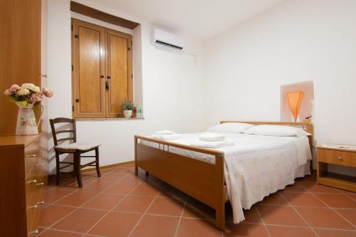 Кровать или кровати в номере Case Vacanze La Venere