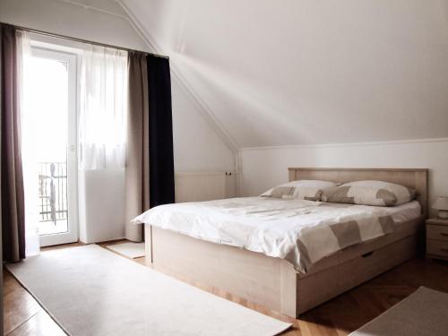 Postel nebo postele na pokoji v ubytování Anita Apartman