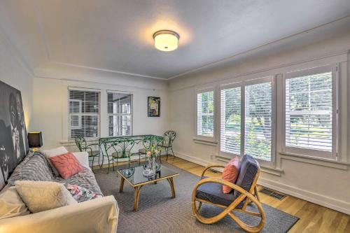 a living room with a couch and a table at Historic Reno Home on Riverwalk 1 Mi to Midtown in Reno