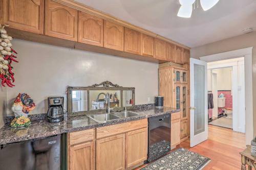 a kitchen with a sink and a counter top at Historic Reno Home on Riverwalk 1 Mi to Midtown in Reno