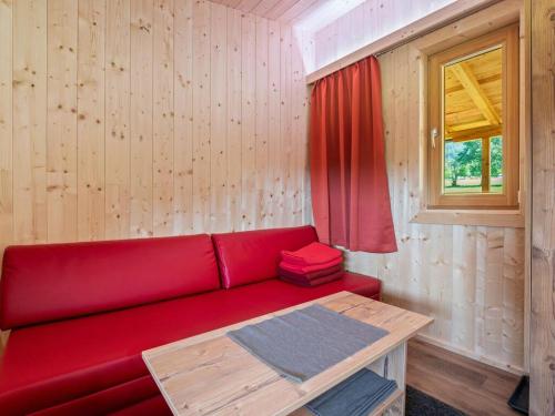 Posezení v ubytování Petzen Cottages - Petzen Chalets