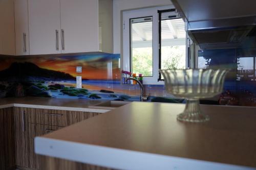 a kitchen with a sink and a counter top at Valtos View in Parga