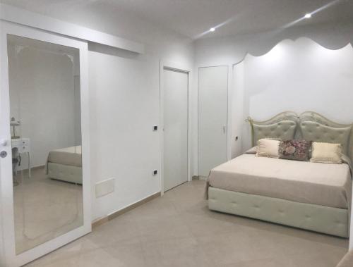 Ένα ή περισσότερα κρεβάτια σε δωμάτιο στο Casa il piccolo principe