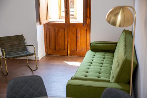 Χώρος καθιστικού στο Glorieta Suites