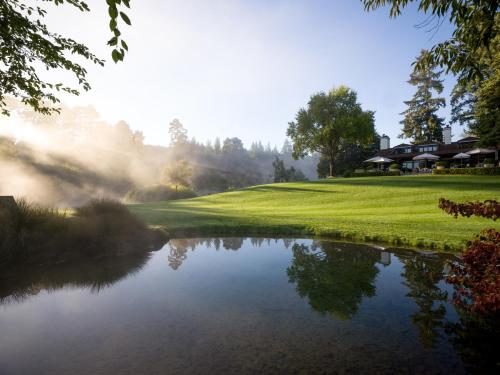 a view of a pond in a golf course at Huka Lodge in Taupo