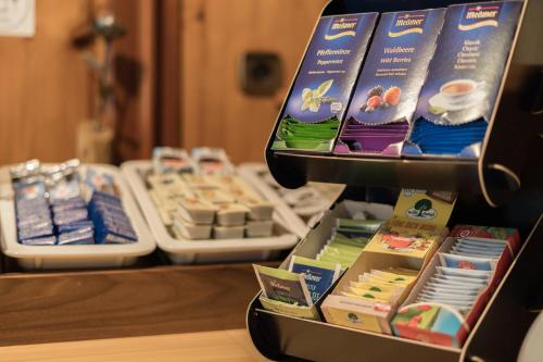 a display case filled with different types of food at Pension Weirather in Imst