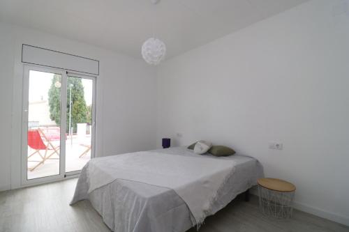 Posteľ alebo postele v izbe v ubytovaní Montsia 23 - Casa con piscina privada en Roses