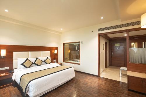 Hotel Sandy's Towerにあるベッド