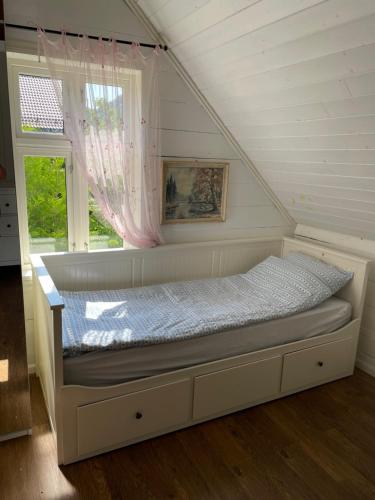 Ліжко або ліжка в номері Gård’s hus i Alver