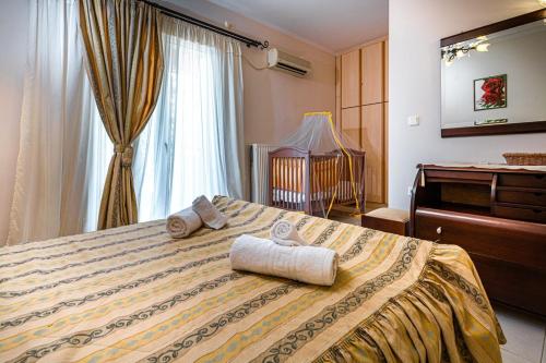 Postel nebo postele na pokoji v ubytování Villa Angelina