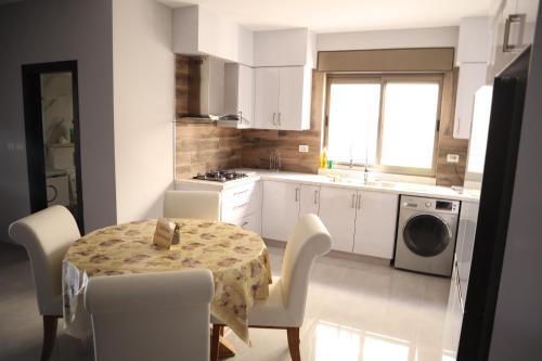 Η κουζίνα ή μικρή κουζίνα στο Sabrina Apartments