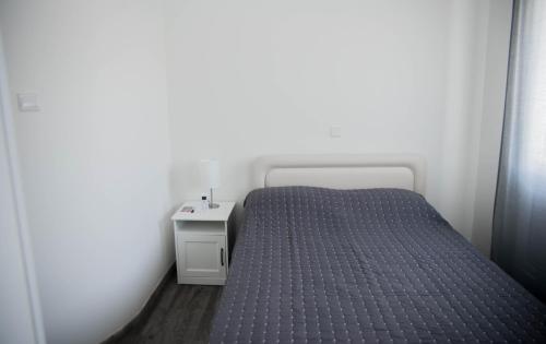 מיטה או מיטות בחדר ב-Amazing Maisonette next to harbour of Paphos CY