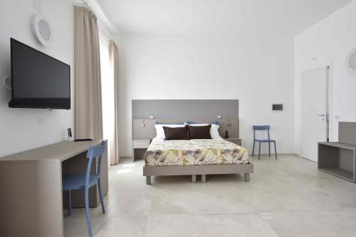 Ένα ή περισσότερα κρεβάτια σε δωμάτιο στο Casa Salemi - Western Sicily Home