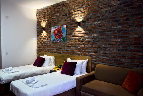 Ένα ή περισσότερα κρεβάτια σε δωμάτιο στο Kumanovo Spa