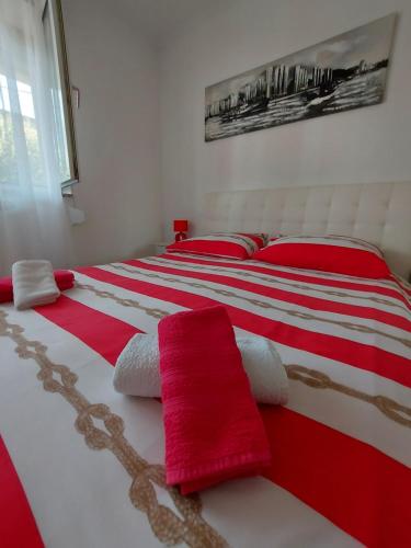 Ένα ή περισσότερα κρεβάτια σε δωμάτιο στο Apartman Palma