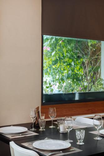 Μια τηλεόραση ή/και κέντρο ψυχαγωγίας στο Hotel Bella Napoli ristorante & spa