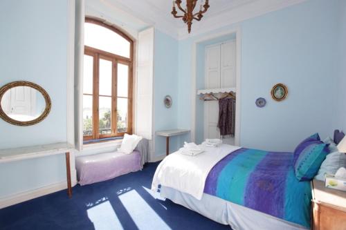 Katil atau katil-katil dalam bilik di Casa Grande Portugal