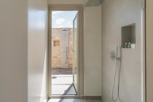 Телевизор и/или развлекательный центр в T7 LUXURY VILLAS PAROS