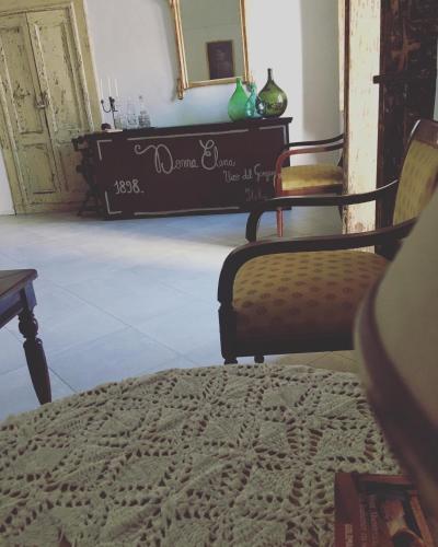 Una cama o camas en una habitación de Donna Elena
