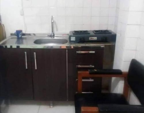 a kitchen with a sink and a counter top at apartaestudio independiente en Manga, Cartagena in Cartagena de Indias