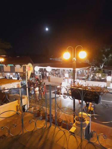 a view of a street at night with lights at B&B La Pavoncella in San Teodoro