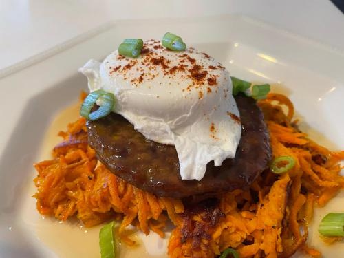a plate of food with a dessert on top of pasta at The Penrose Bed & Breakfast in Sedona